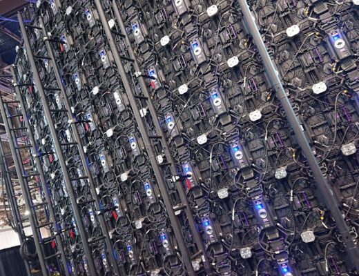 Reverse side of an LED video wall showing interconnections and power cables for each foot-square panel.