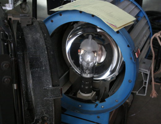 Arri Compact 6000 light, with the lens hinged open to reveal the bulb and reflector inside