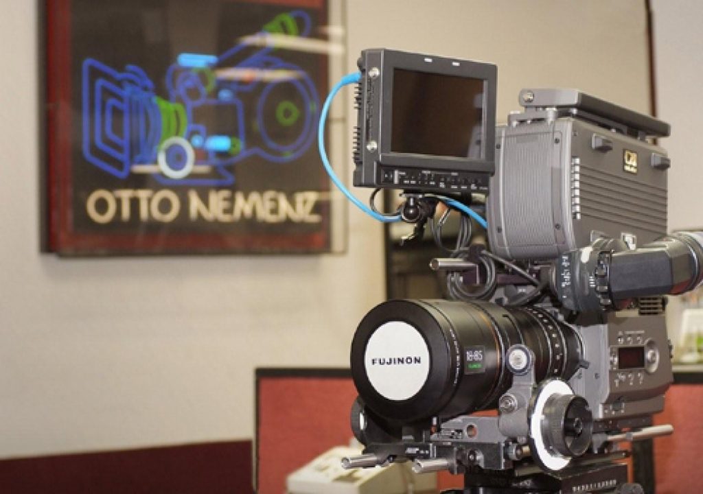 Otto_Nemenz_Lens_shot_with_sign_11_24_09.jpg