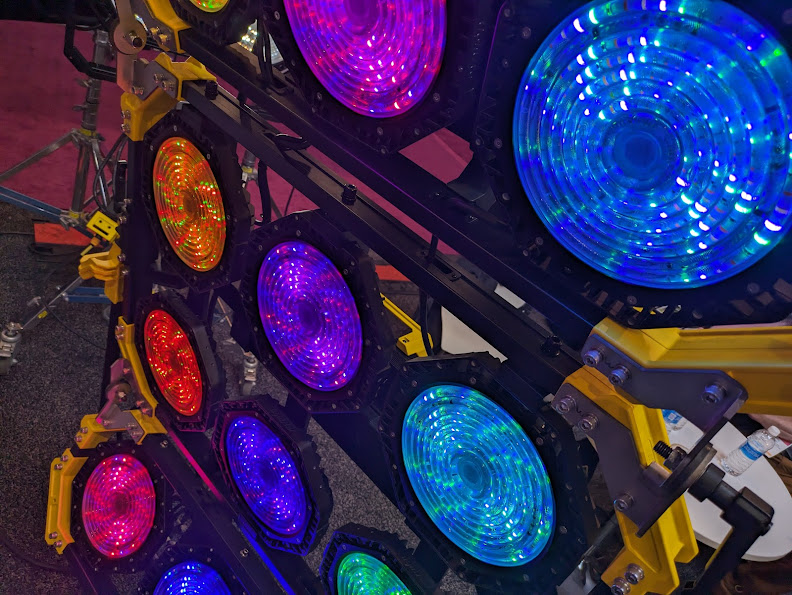 An array of high-power LED movie lights in various saturated colours.