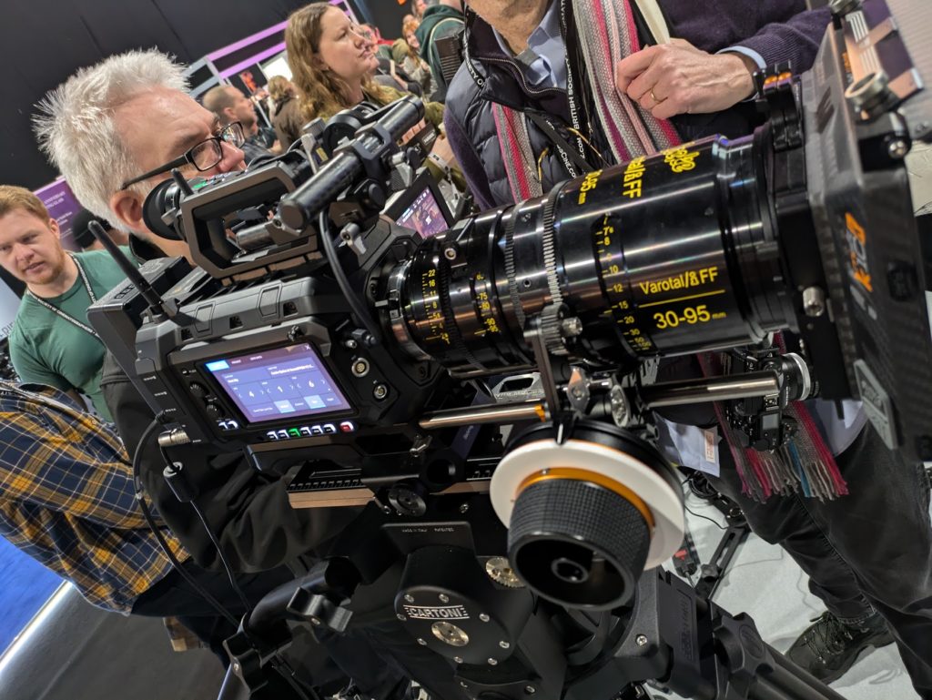 Crowds gather around a high end cinema camera set up at the 2025 BSC Exoo