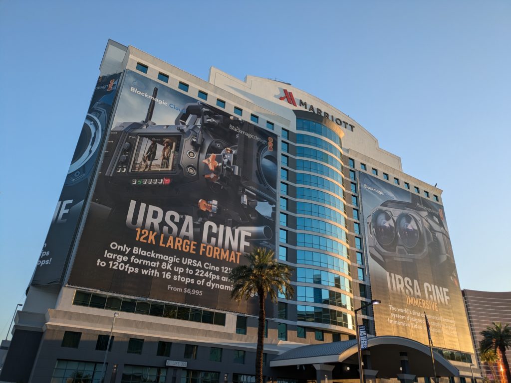 Wide angle looking up at the Las Vegas Marriott hotel, with huge posters promoting Blackmagic's Ursa Cine 17K camera.
