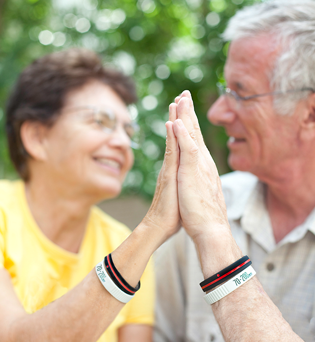 Sara_and_Karl_wearing_their_Lens_Bracelets.jpg