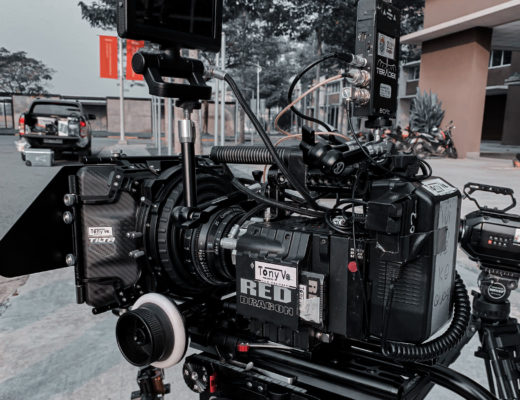 A digital cinema camera with lots of accessories attached.