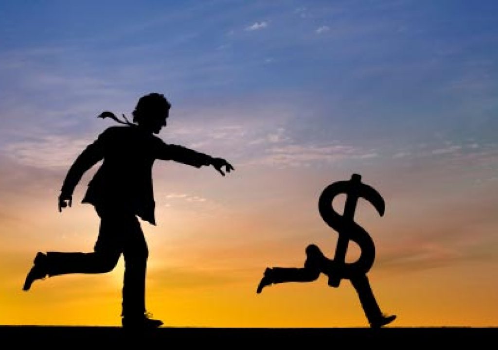 man-chasing-money.jpg